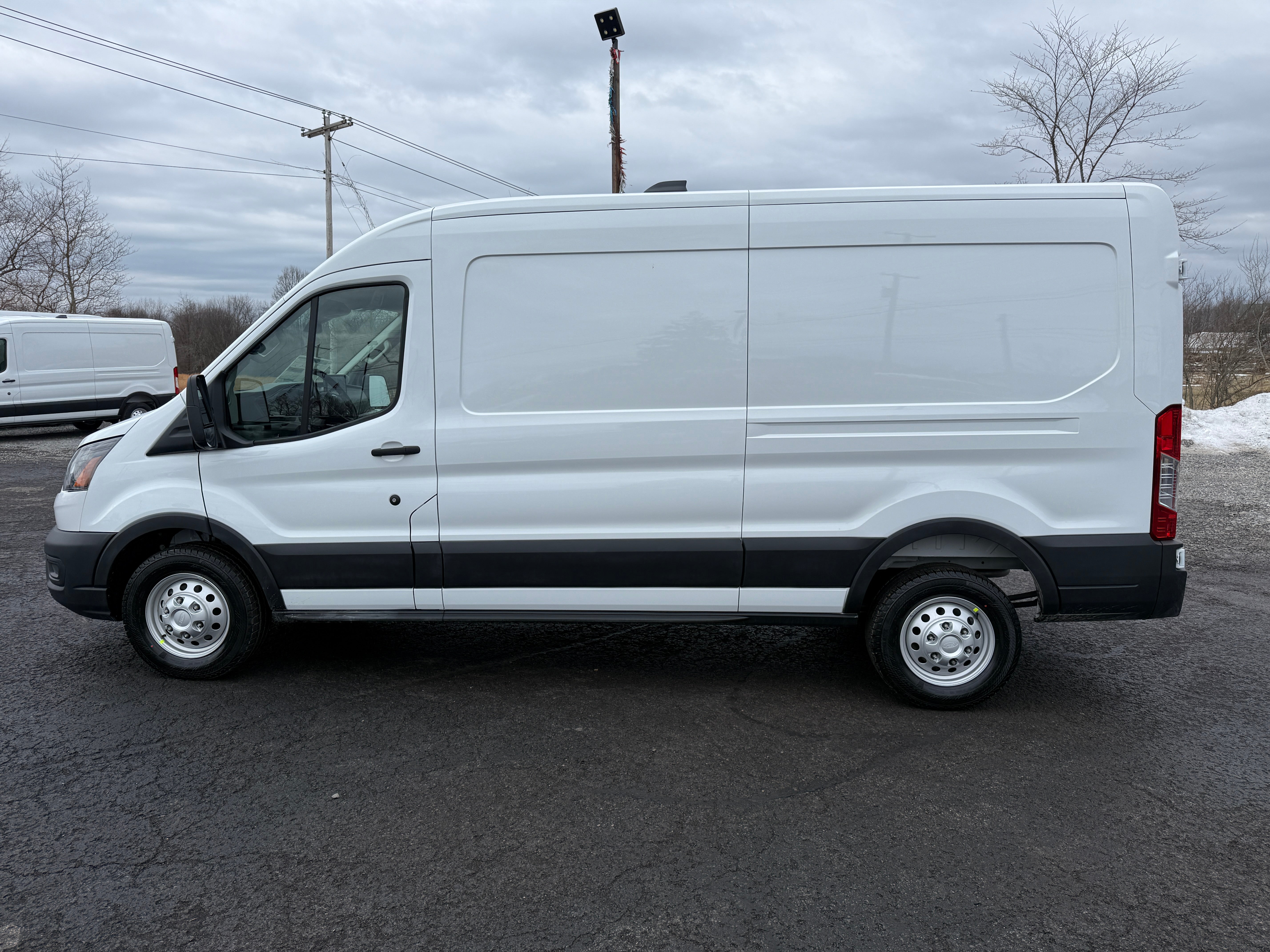 2026 Ford Transit Cargo Van T-250 148" Med Rf 9150 GVWR AWD