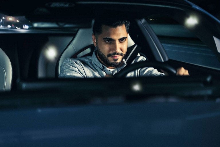 Person sitting in the driver’s seat of a parked 2024 Ford Mustang® coupe | Scott Ford in Kingwood WV